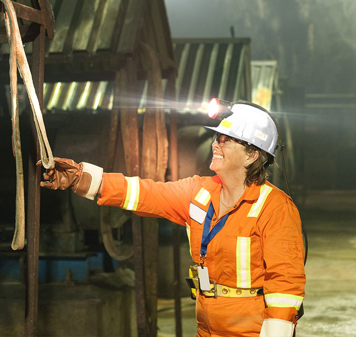 Smiling woman in high vis and hard hat