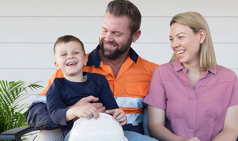 Happy family of mum, dad and child.